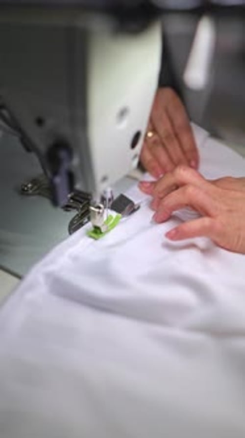 Woman Working Sewing Machine Stitching White Fabric