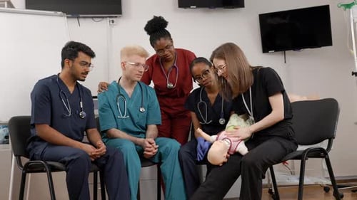 Medical Team Training on Baby Mannequin