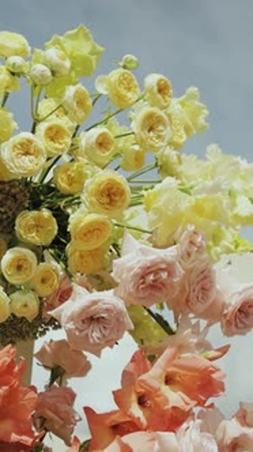 Floral Arrangement of Roses and Colorful Flowers