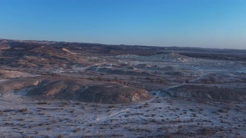 Aerial video over a desert area in southern Israel. at sunset
