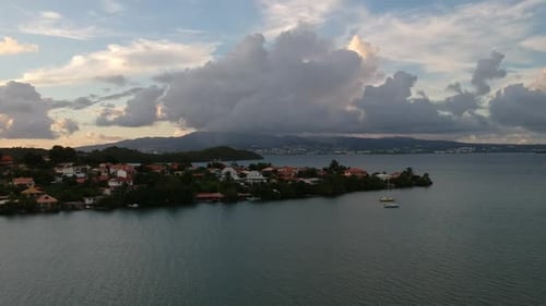 Tropical Island Coastline During a Vibrant Sunset