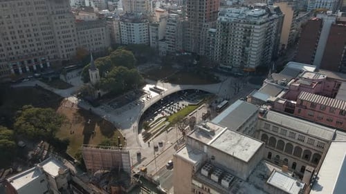 The bustling city square Aerial view of people and traffic in the park