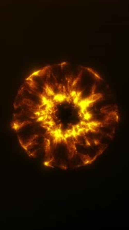 Looping golden energy burst ring of bright radiant particles with fiery digital motion