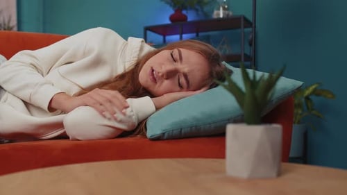 Scared Tired Young Woman Wakes Up From Bad Nightmare in Bedroom at Home Stress Nervousness Anxiety