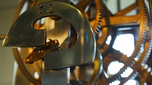 Closeup View of Metal Parts of the Clock Mechanism Which is Located in the Tower in the Historical