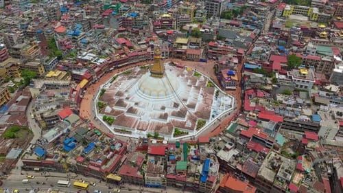 Boudhanath Stupa Towering Over The Townscape Of Kathmandu, Nepal, South Asia. Aerial Drone Shot