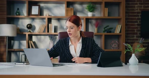 Woman checking email celebrating success victory surprise and raising hands to top. Business woman r