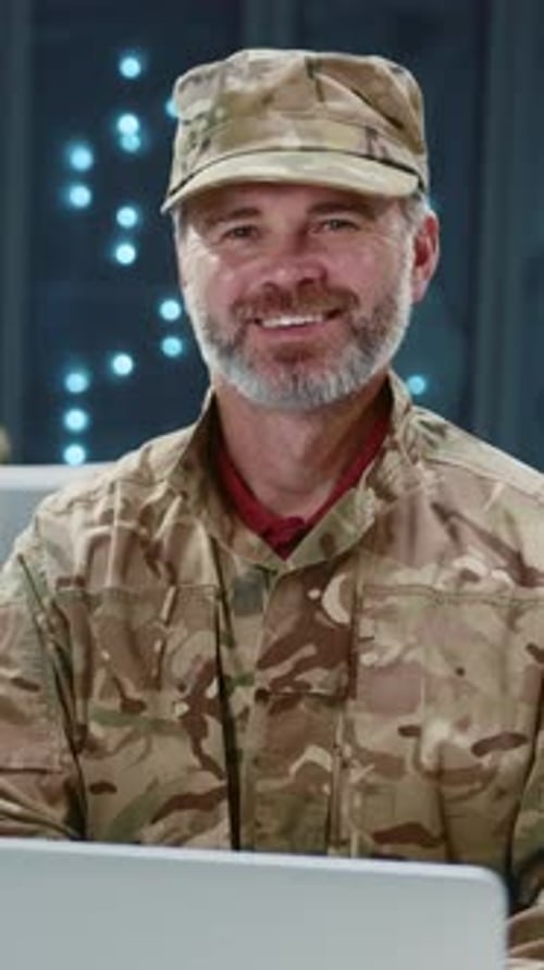 Smiling Soldier in Camouflage Uniform Cooperating at Cyber Security Office Two Army Officers