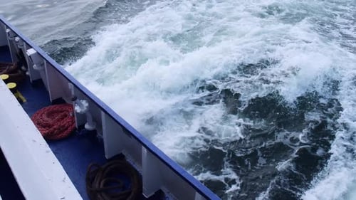 Wake of Vessel Wide Wake Trail From Boat Ocean Water Deep Blue Trace From Large Ship Sunset Rays on