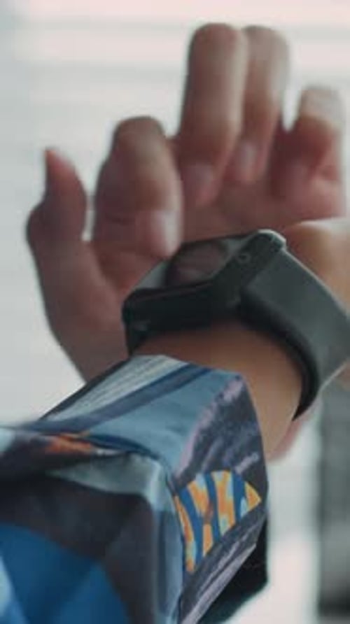 Hand Interacts With Smart Watch Close Up