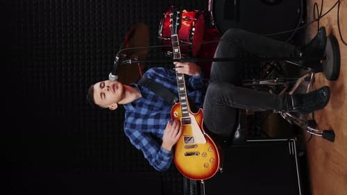 Man playing on electric guitar