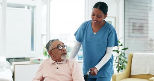 Healthcare, nurse and old man in wheelchair at nursing home for people with disability