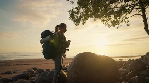 Woman Tourist Walks on Sandy Sea Beach Female Traveler Carrying Big Backpack with Touristic