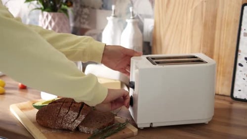 Toaster Toasts Bread in a Kitchen Setting
