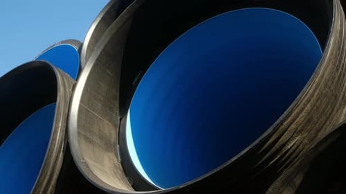 Large Black Plastic Sewer Pipes Outside Close Up