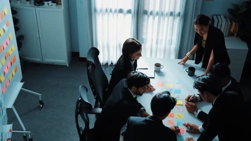 Top view of business people brainstorm idea by using sticky notes. Directorate.