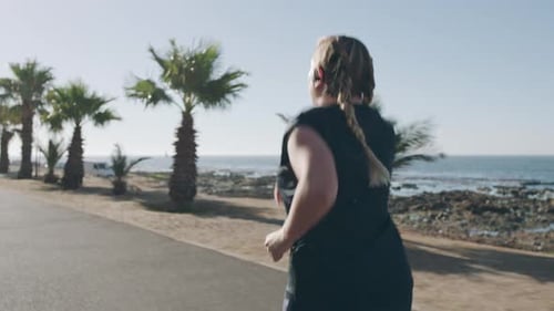Fitness, run and woman training in the street and city of Australia for cardio exercise
