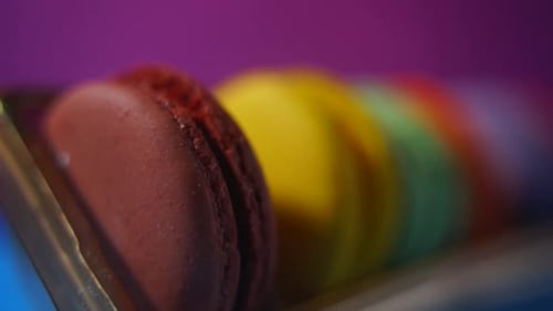 Colorful Macarons Close-Up in Container