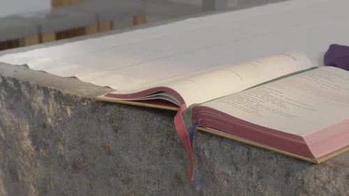 Open Bible on an altar, a small cross is covered.