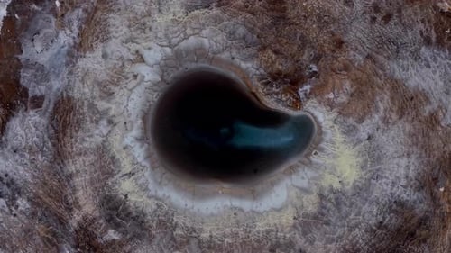 Aerial view of a dark lake in Hrunamannahreppur, Iceland.