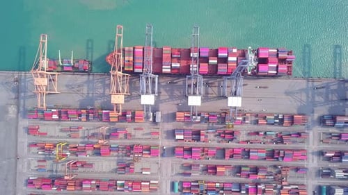 Aerial View of Cargo Ship and Shipping Containers