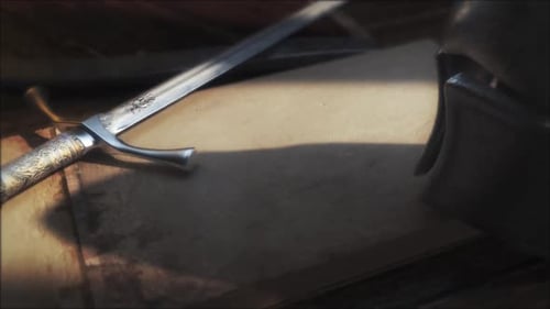 Ancient Sword and Helmet on Aged Paper Reveal Opener