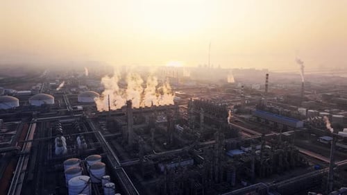 erial view of chimneys of power plant, an industrial district. Modern large thermal power plant