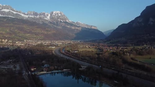 Bird's eye view of the village of Passy in the French Mont Blanc valley with the mountains in the ba