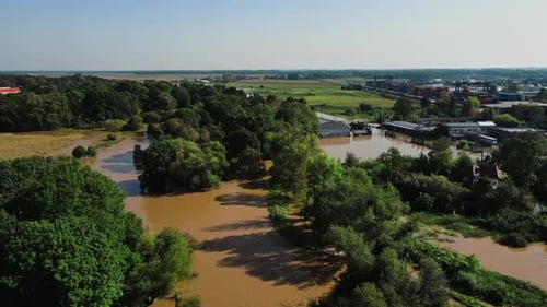 Flooded Rural Area with Trees Houses and Buildings After Heavy Rainfall Aerial View