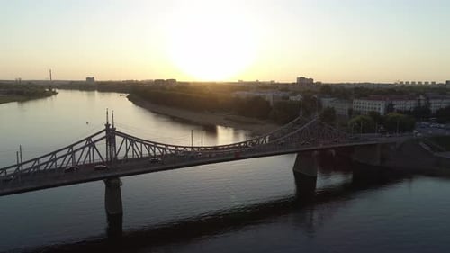 Aerial View of the Road Bridge Across the River at Sunset Beautiful Cityscape