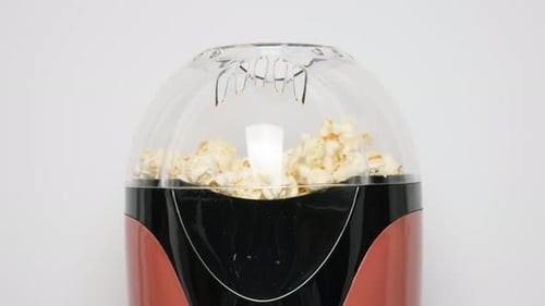 Close Up View on Home Popcorn Maker Making Fresh Crispy Popcorn Popcorn Popper or Machine for Doing