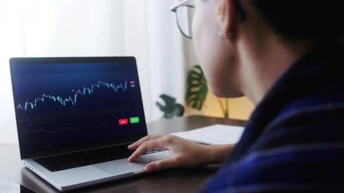 Trader woman analyzing strategy for stock market investment at home office. Crypto money