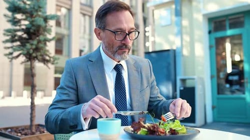 Middle aged business man going to work at his office.