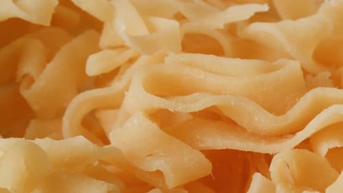 Close Up View of Uncooked Wide Noodles