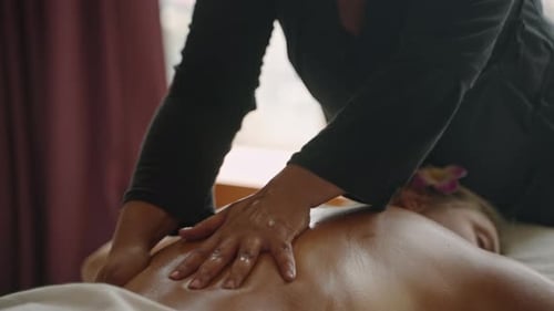 Relaxing Back Massage in Spa Setting