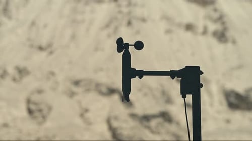 Anemometer Measures Wind Speed in Snowy Mountains