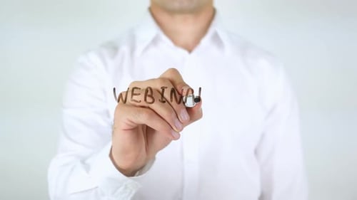 Webinar Man Writing on Glass