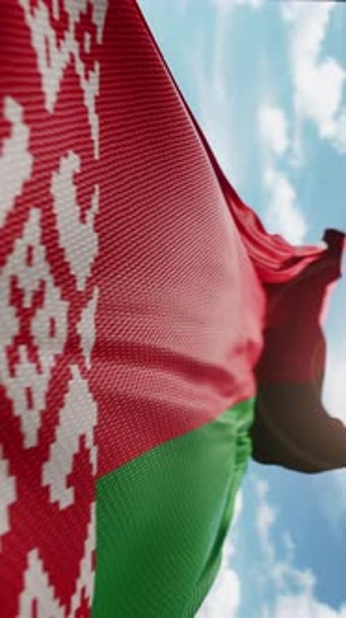 Realistic Vertical National Flag Waving in Wind with Sky