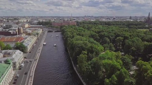 Saint-Petersburg, an aerial drone footage of a boat in a river, channel, Church of Savior on Blood,