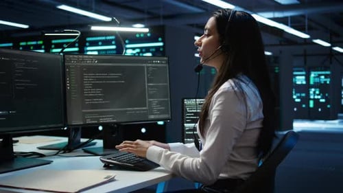 Worker in Server Farm Establishment Oversees Infrastructure Systems