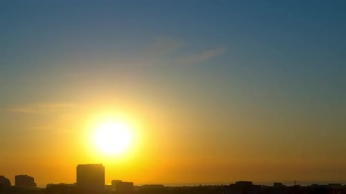 Sunrise over a Seaside Town