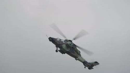 Military Helicopter Flying in Sky