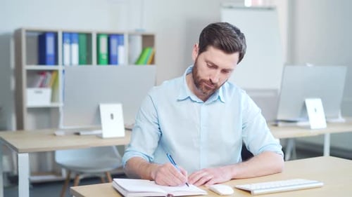 Male Employee Entrepreneur Office Worker Listening Online Conference Training Writing In Notepad Sit