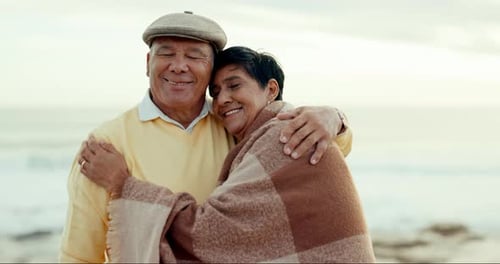 Senior couple, hug and happy at the beach for love, commitment and adventure outdoor