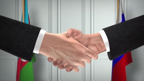 International Handshake Agreement with National Flags Background