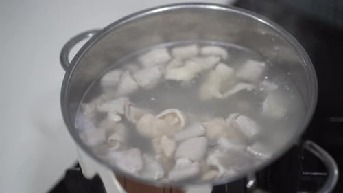 Chicken Boiling in Pot for Asian Food