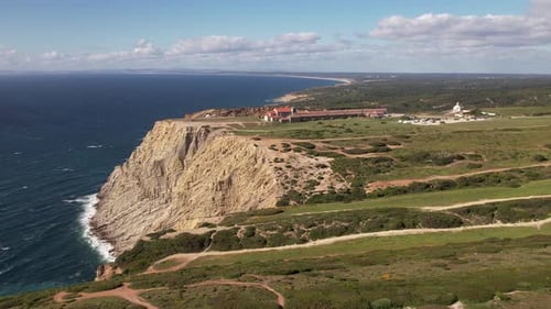 Dramatic Coastline with Lighthouse Aerial View