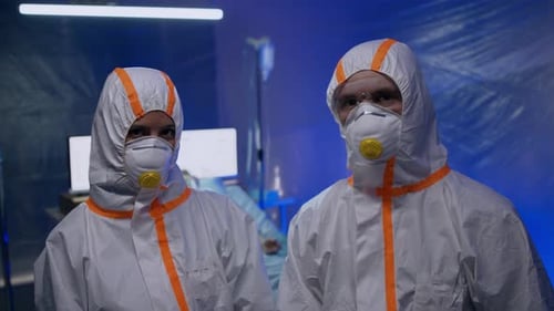 Doctors with Protective Suit and Mask in Hospital, Coronavirus Concept