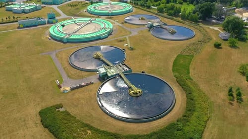 Aerial view of modern water cleaning facility at urban wastewater treatment plant. Purification proc