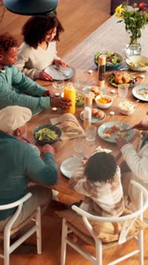 Family Enjoying a Meal Together at Home